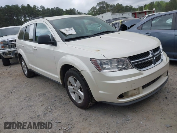 2014 Dodge Journey SE with VIN 3C4PDCABXET135338, listed as a IAAI auction lot 41950088 with 209,944 mi miles. Bid and sale history available at carsss.com. Image 1.