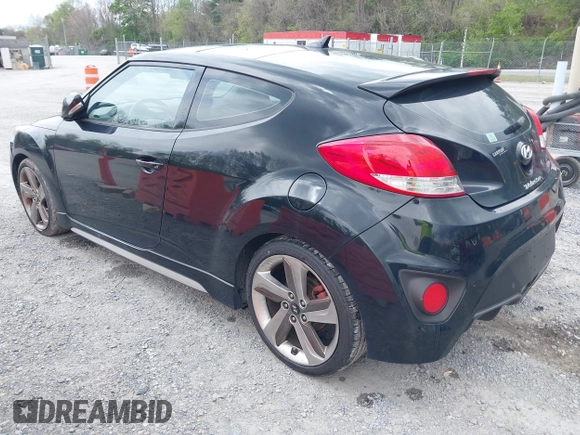 2013 Hyundai Veloster Turbo z VIN KMHTC6AE7DU106831, wystawiony jako IAAI lot #42115348 z przebiegiem 166 914 mil mil oraz . Historia ofert i sprzedaży dostępna na DreamBid. Obrazek 3.