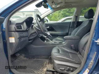 2019 Kia Niro Touring with VIN KNDCE3LCXK5345712, listed as a Copart auction lot 61921284 with 57,903 mi miles and Salvage Title. Bid and sale history available at carsss.com. Image 7.