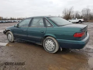 1995 Ford Taurus GL with VIN 1FALP52U1SA108202, listed as a Copart auction lot 85676434 with 102,669 mi miles and Salvage title. Bid and sale history available at DreamBid. Image 2.