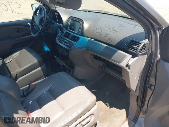 2010 Honda Odyssey Touring z VIN 5FNRL3H90AB085105, wystawiony jako IAAI lot #42142123 z przebiegiem Nie podano mil oraz . Historia ofert i sprzedaży dostępna na DreamBid. Obrazek 5.