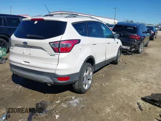 2017 Ford Escape Titanium with VIN 1FMCU0JD6HUE01006, listed as a IAAI auction lot 41632918 with 70,927 mi miles. Bid and sale history available at carsss.com. Image 4.