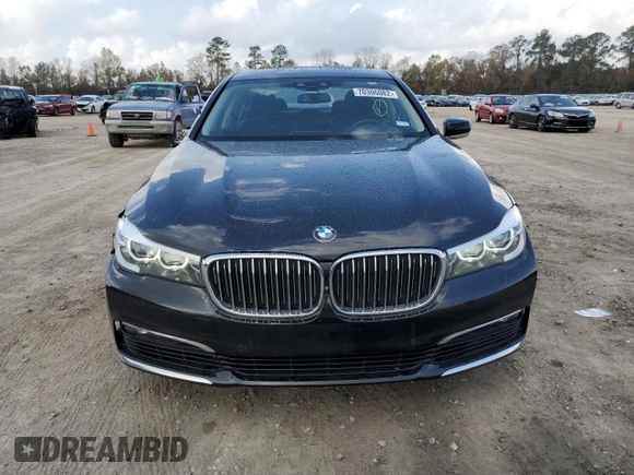 2018 BMW 7 Series 740i with VIN WBA7E2C54JG742927, listed as a Copart auction lot 70306082 with 69,735 mi miles. Bid and sale history available at carsss.com. Image 5.