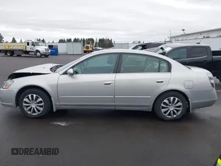 2006 Nissan Altima S with VIN 1N4AL11D46N392467, listed as a IAAI auction lot 41605074 with 96,987 mi miles and . Bid and sale history available at DreamBid. Image 14.