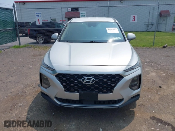 2019 Hyundai Santa Fe SE z VIN 5NMS2CAD2KH058961, wystawiony jako IAAI lot #42395683 z przebiegiem 81 228 mil mil oraz . Historia ofert i sprzedaży dostępna na DreamBid. Obrazek 12.