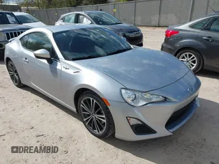 2015 Scion FR-S z VIN JF1ZNAA10F8711526, wystawiony jako IAAI lot #42179395 z przebiegiem 97 939 mil mil oraz . Historia ofert i sprzedaży dostępna na DreamBid. Obrazek 1.