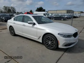 2018 BMW 5 Series 530e xDrive with VIN WBAJB1C58JB084907, listed as a Copart auction lot 49901795 with 109,617 mi miles and Salvage title. Bid and sale history available at DreamBid. Image 4.