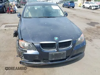 2007 BMW 3 Series 328xi with VIN WBAVC93527KX56871, listed as a IAAI auction lot 42622580 with 164,047 mi miles and . Bid and sale history available at DreamBid. Image 14.