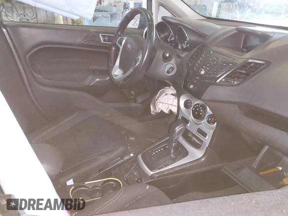 2014 Ford Fiesta SE with VIN 3FADP4BJ9EM117175, listed as a IAAI auction lot 41737432 with 156,141 mi miles. Bid and sale history available at carsss.com. Image 5.