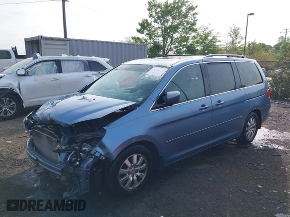2010 Honda Odyssey EX-L with VIN 5FNRL3H63AB075187, listed as a IAAI auction lot 42114126 with 131,272 mi miles. Bid and sale history available at carsss.com. Image 2.