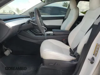 2020 Tesla Model Y Long Range z VIN 5YJYGDEE2LF049815, wystawiony jako Copart lot #53738165 z przebiegiem 113 779 mil mil oraz Szkoda całkowita • Salvage title. Historia ofert i sprzedaży dostępna na DreamBid. Obrazek 7.