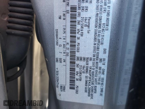2018 Ford Focus SE with VIN 1FADP3FE4JL308909, listed as a Copart auction lot 61489005 with 58,613 mi miles and Salvage title. Bid and sale history available at DreamBid. Image 12.