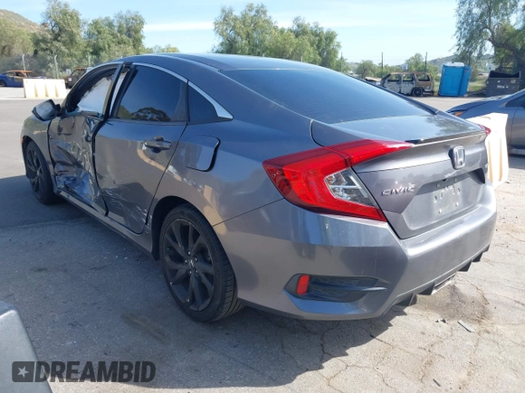 2019 Honda Civic Sedan Sport with VIN 2HGFC2F8XKH557203, listed as a IAAI auction lot 41846429 with 105,598 mi miles. Bid and sale history available at carsss.com. Image 3.