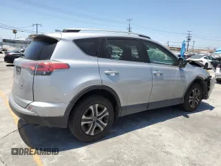 2017 Toyota RAV4 LE with VIN 2T3BFREV6HW658235, listed as a Copart auction lot 63409005 with 62,303 mi miles and Salvage title. Bid and sale history available at DreamBid. Image 3.