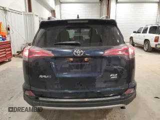 2018 Toyota RAV4 XLE with VIN JTMRFREV2JD254334, listed as a Copart auction lot 53079335 with 27,717 mi miles and Clean Title. Bid and sale history available at DreamBid. Image 6.