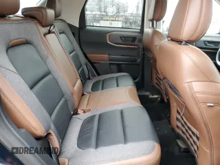2023 Ford Bronco Sport Outer Banks z VIN 3FMCR9C6XPRD86181, wystawiony jako Copart lot #53264485 z przebiegiem 22 464 mil mil oraz Szkoda całkowita • Salvage title. Historia ofert i sprzedaży dostępna na DreamBid. Obrazek 11.