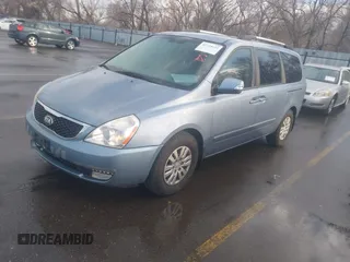 2014 Kia Sedona LX with VIN KNDMG4C79E6547589, listed as a IAAI auction lot 41724633 with 211,213 mi miles. Bid and sale history available at carsss.com. Image 2.