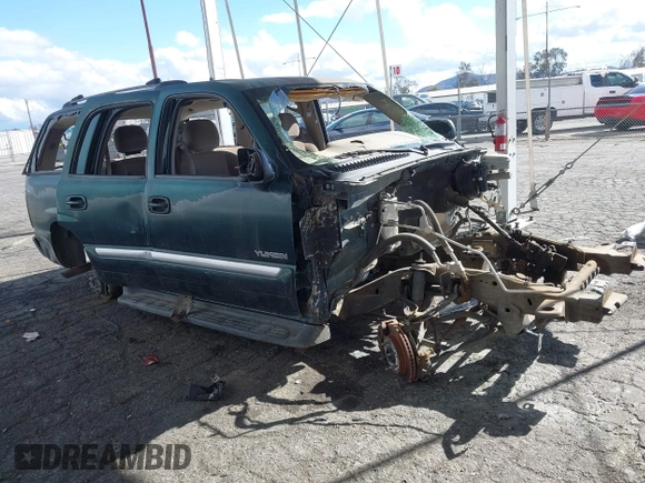 2003 GMC Yukon SLT z VIN 1GKEC13V43J304588, wystawiony jako IAAI lot #41525446 z przebiegiem Nie podano mil oraz . Historia ofert i sprzedaży dostępna na DreamBid. Obrazek 1.