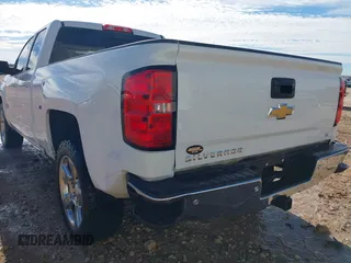 2018 Chevrolet Silverado 1500 LT with VIN 1GCRCREC4JZ368426, listed as a IAAI auction lot 41343347 with 114,821 mi miles and . Bid and sale history available at DreamBid. Image 22.