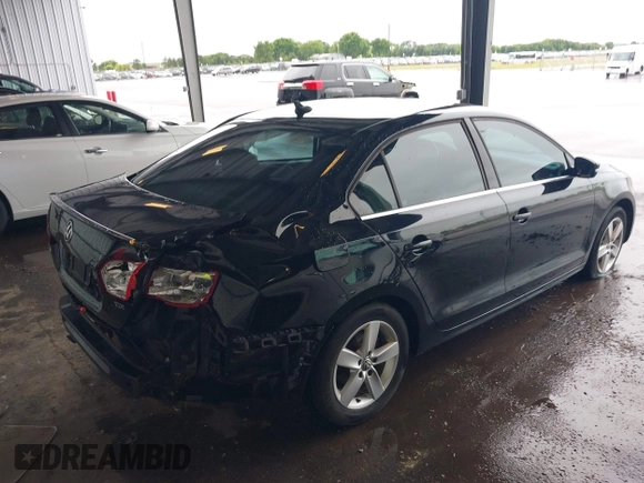 2012 Volkswagen Jetta TDI w/Premium & Nav with VIN 3VWLL7AJ8CM326549, listed as a IAAI auction lot 42748170 with 200,385 mi miles and . Bid and sale history available at DreamBid. Image 4.