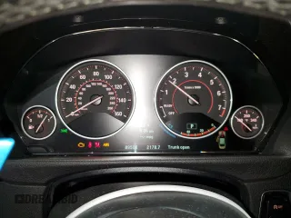 2014 BMW 4 Series 435i with VIN WBA3R1C52EK192076, listed as a Copart auction lot 60098595 with 89,504 mi miles and Salvage title. Bid and sale history available at DreamBid. Image 9.
