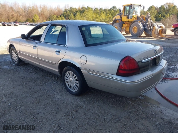 2007 Mercury Grand Marquis LS with VIN 2MEFM75V87X628541, listed as a IAAI auction lot 41051994 with 183,363 mi miles. Bid and sale history available at carsss.com. Image 3.