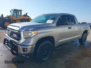 2014 Toyota Tundra SR with VIN 5TFRM5F13EX078411, listed as a IAAI auction lot 42702477 with 123,336 mi miles and . Bid and sale history available at DreamBid. Image 17.