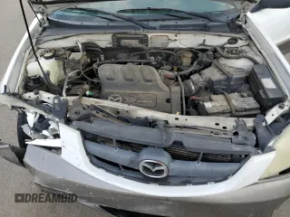 2003 Mazda Tribute LX with VIN 4F2CZ94123KM56293, listed as a Copart auction lot 65930574 with 175,150 mi miles and Salvage Title. Bid and sale history available at carsss.com. Image 11.