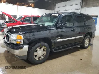2004 GMC Yukon SLE with VIN 1GKEK13Z44J142047, listed as a Copart auction lot 41384345 with 303,917 mi miles and Salvage Title. Bid and sale history available at carsss.com. Image 1.