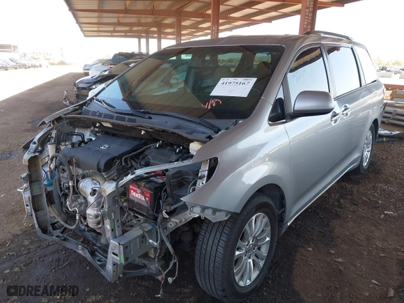 2016 Toyota Sienna XLE with VIN 5TDYK3DCXGS751231, listed as a IAAI auction lot 41975167 with 135,266 mi miles. Bid and sale history available at carsss.com. Image 17.