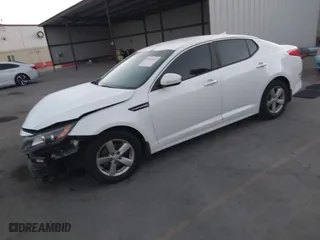 2014 Kia Optima LX with VIN 5XXGM4A71EG282032, listed as a IAAI auction lot 40927015 with 117,746 mi miles. Bid and sale history available at carsss.com. Image 18.