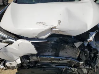 2018 Toyota RAV4 SE with VIN 2T3JFREV9JW801731, listed as a Copart auction lot 55866485 with 64,043 mi miles and Salvage title. Bid and sale history available at DreamBid. Image 12.