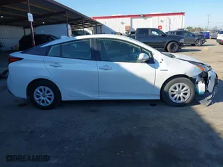 2022 Toyota Prius L Eco with VIN JTDKAMFU2N3161771, listed as a IAAI auction lot 41428804 with 113,777 mi miles. Bid and sale history available at carsss.com. Image 14.