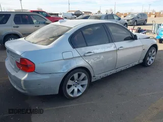 2007 BMW 3 Series 328xi with VIN WBAVC93577KX56977, listed as a IAAI auction lot 41349967 with 1 mi miles. Bid and sale history available at carsss.com. Image 4.
