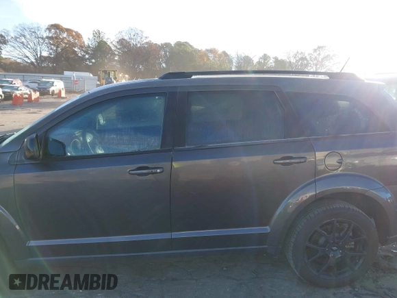 2018 Dodge Journey SXT with VIN 3C4PDCBB6JT208889, listed as a IAAI auction lot 41099570 with 104,791 mi miles and . Bid and sale history available at DreamBid. Image 14.