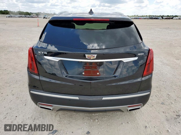 2021 Cadillac XT5 FWD Premium Luxury with VIN 1GYKNCRS0MZ100515, listed as a Copart auction lot 62856785 with 50,298 mi miles and Salvage title. Bid and sale history available at DreamBid. Image 6.