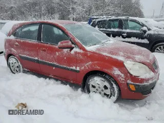 2009 Kia Rio LX with VIN KNADE243596480661, listed as a Copart auction lot 87673065 with 128,733 mi miles and Clean Title. Bid and sale history available at carsss.com. Image 4.