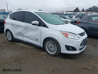 2016 Ford C-Max Energi SEL with VIN 1FADP5CU0GL112403, listed as a IAAI auction lot 41777978 with 136,184 mi miles. Bid and sale history available at carsss.com. Image 1.