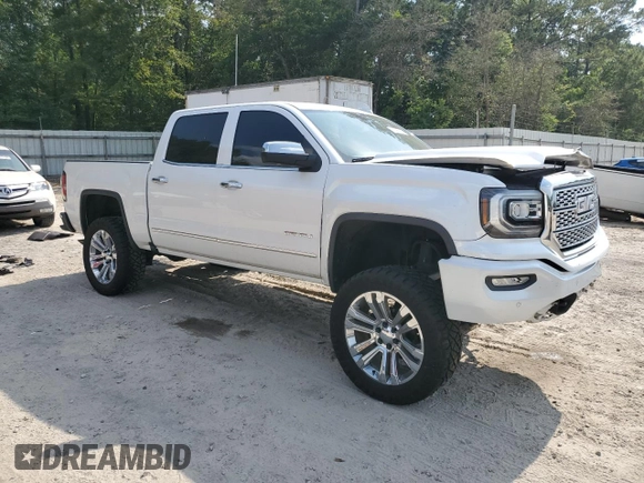 2017 GMC Sierra 1500 Denali z VIN 3GTU2PEJ2HG433669, wystawiony jako Copart lot #57460285 z przebiegiem 131 113 mil mil oraz Szkoda całkowita • Salvage title. Historia ofert i sprzedaży dostępna na DreamBid. Obrazek 4.