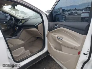2015 Ford Escape SE with VIN 1FMCU9GX8FUC80918, listed as a IAAI auction lot 41694880 with 182,929 mi miles. Bid and sale history available at carsss.com. Image 5.