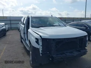 2015 Chevrolet Suburban LTZ with VIN 1GNSKKKC6FR153077, listed as a IAAI auction lot 42415842 with 126,608 mi miles and . Bid and sale history available at DreamBid. Image 1.