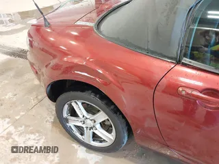 2007 Mazda MX-5 Miata Sport z VIN JM1NC25F970132299, wystawiony jako IAAI lot #41622791 z przebiegiem 72 392 mil mil oraz . Historia ofert i sprzedaży dostępna na DreamBid. Obrazek 6.