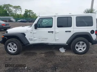 2021 Jeep Wrangler Unlimited Willys with VIN 1C4HJXDG9MW582361, listed as a IAAI auction lot 42243238 with 78,692 mi miles and . Bid and sale history available at DreamBid. Image 14.