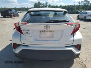 2018 Toyota C-HR XLE z VIN NMTKHMBX4JR031512, wystawiony jako Copart lot #55096715 z przebiegiem 100 522 mil mil oraz Szkoda całkowita • Salvage title. Historia ofert i sprzedaży dostępna na DreamBid. Obrazek 6.