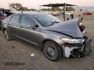 2014 Ford Fusion Titanium with VIN 3FA6P0K9XER367549, listed as a Copart auction lot 85566204 with 117,243 mi miles and Salvage Title. Bid and sale history available at DreamBid. Image 4.