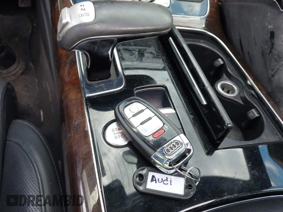 2015 Audi A8 L 4.0T with VIN WAU32AFD4FN041084, listed as a IAAI auction lot 41450453 with 86,199 mi miles. Bid and sale history available at carsss.com. Image 11.