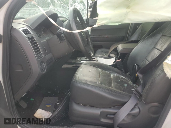 2012 Ford Escape Limited с VIN 1FMCU9EG1CKC48497, выставлен на аукционе Copart как лот 64093065 с пробегом 189 856 миль миль и Списание • Salvage title. История ставок и продаж доступна на DreamBid. Изображение 7.
