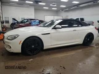 2014 BMW 6 Series 650i with VIN WBAYP9C54ED169509, listed as a Copart auction lot 71931664 with 70,692 mi miles and Salvage Title. Bid and sale history available at carsss.com. Image 1.
