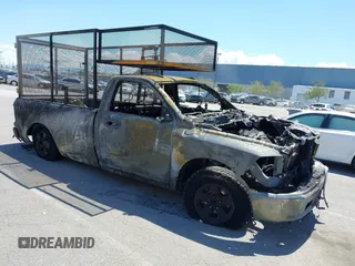 2021 Ram 1500 Tradesman with VIN 3C6JR6DG0MG518784, listed as a IAAI auction lot 42260175 with Not provided miles and . Bid and sale history available at DreamBid. Image 1.