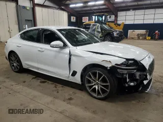 2023 Genesis G70 2.0T with VIN KMTG34TA5PU128224, listed as a Copart auction lot 82026383 with 7,311 mi miles and Salvage Title. Bid and sale history available at DreamBid. Image 4.